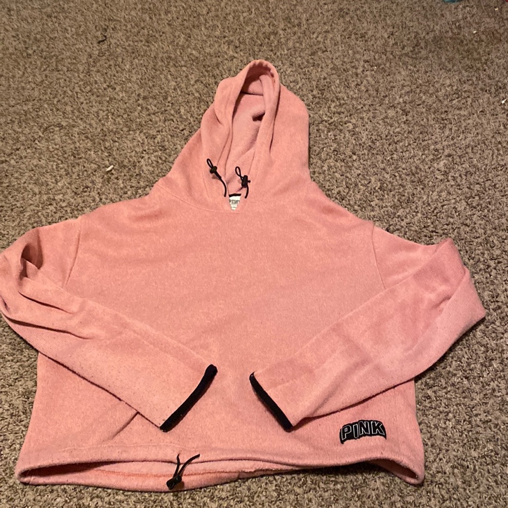 This top is pink with soft material on the inside
